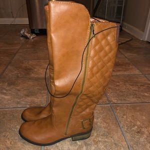 Brown riding boots from JCPenny’s